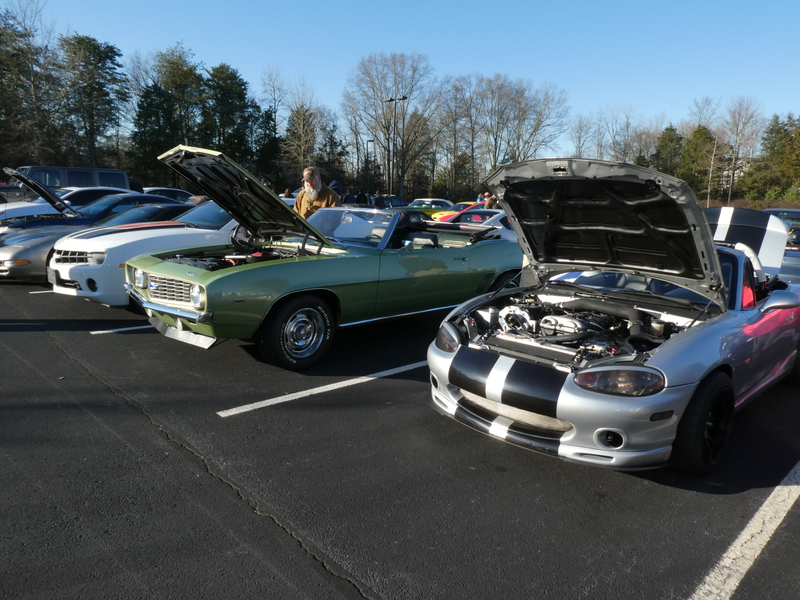 And a classic Camaro convertible on the other side.